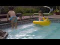 John Elee playing with Audrey and Tiki, by the pool 2