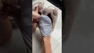 Gray Socks Off & Feet Resting On Soft Slippers Slow Calm