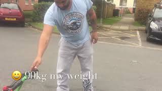 96kg Man On A Kids Quad 49cc Zipper