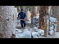 I built a stone and wood survival bushcraft shelter in the forest