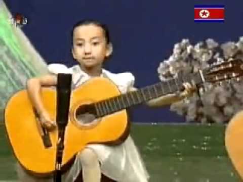 Watch niños genios con la guitarra
