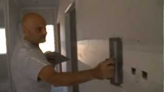How to first coat a drywall flat joint with a hawk and trowel