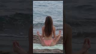 Cute Girl Doing Yoga In Beach
