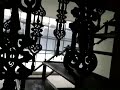 чугунными балясинами, столбами и навершиями 