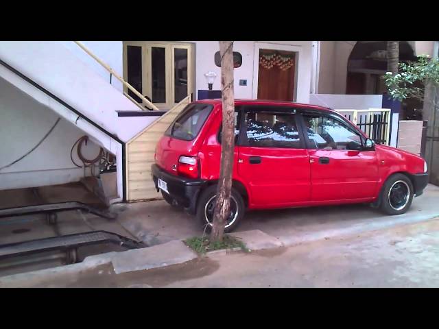 Genius Parks His Compact Car Under Stairs - Video