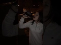 Girl drinking 1 full bottle of alcohol