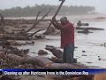 Residents clean up beaches after Hurricane Irene