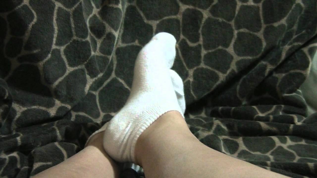 White socks tease barefoot