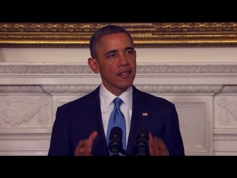 Exclusive: Obama says Iran must halt nuclear work for at least a.