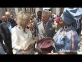 Camilla tries on Zulu headdress