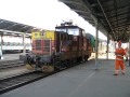 Czech Republic: Ceske Budejovice, station announcement as Class 210 electric locomotive speeds out