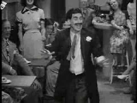 Groucho sings his signature song, "Lydia the Tattooed Lady," in At the 