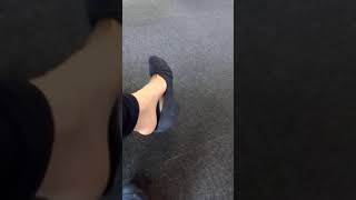 Dangling My Shoes And Showing My Feet In The Library