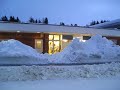 Snow piles up in front of Cordova, AK businesses