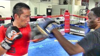 Japanese fighter Shoma Fukumoto padwork with Jeff Mayweather inside the Mayweather Boxing Club