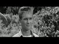 IN HARM'S WAY - Admiral Torrey (John Wayne) reconciled with son (Brandon De Wilde)