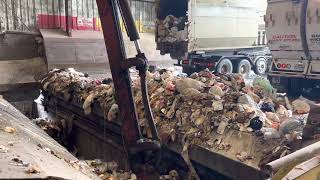 Watch A Pro Load A 53 Trailer Full Of Garbage.