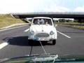 Goggomobil car on tow on German Autobahn