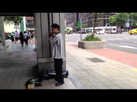 Boy plays Flute in Taipei