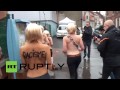 France: Topless FEMEN chant anti-Nazi song against Le Pen