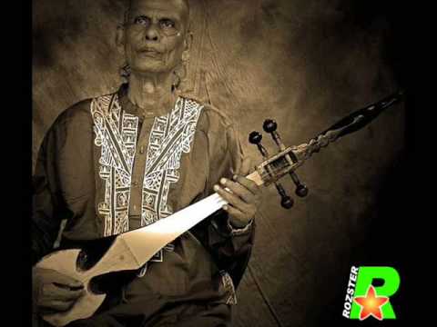 Baul Shah Abdul Karim Jhe Guneh Bondhure Pabo by Rozster