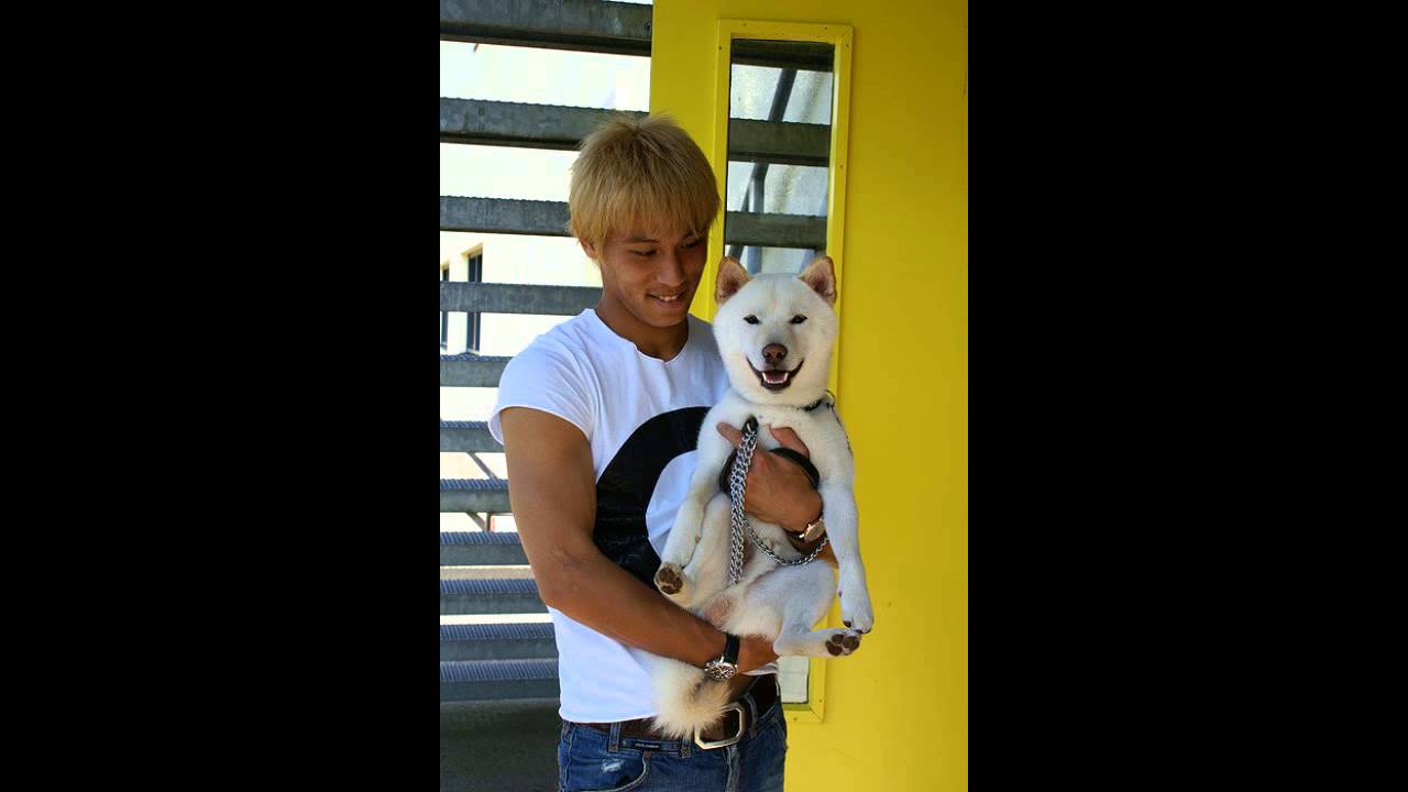 Photo of Keisuke Honda & his Dog Tetsu