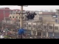 Shocking footage: Drunk man hangs upside down from electricity wires in China