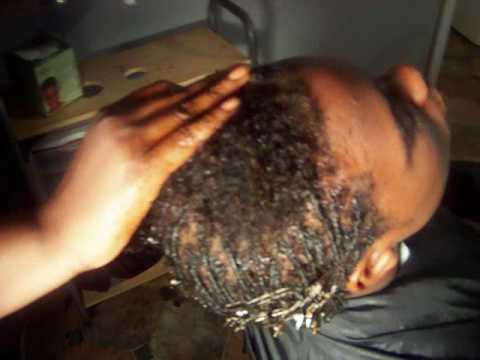 Video on me starting dread locks on my client. www.Thebestsalon.com.