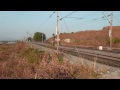 indiantrains@ long blue express train at scenic vaitarna station, thane, maharashtra, india