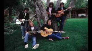 Watch Traveling Wilburys New Blue Moon video