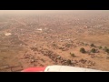 Landing at Juba International Airport in South Sudan -- Huts and UN Aircraft