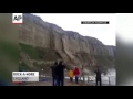 Raw: Dramatic Footage of Cliff Collapse in UK