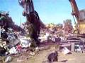 Demolishishing & Crushing a 97 Chrysler LHS with a excavator