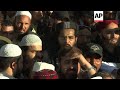 Funeral of Pakistan cleric whose teaching influenced militants and Taliban