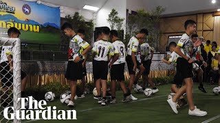 Rescued Thai boys kick footballs at beginning of press conference Rescued Thai boys kick footballs at beginning of press conference
