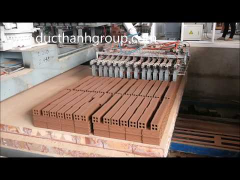 Robot xếp gạch ống 4 lỗ tuynel lên goòng tự động