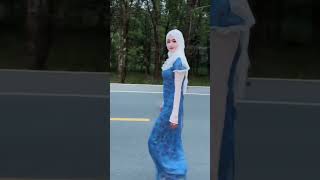 Chinese Muslim Girl Is Walking Leisurely