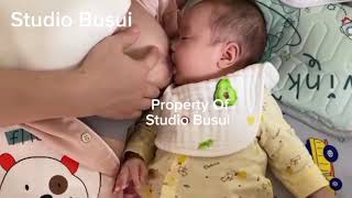 Ibu Menyusui Bayi Miring