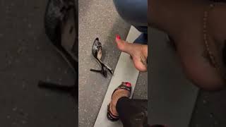 Feet Dangling In Subway Heel Dangling Playing In Public Subway