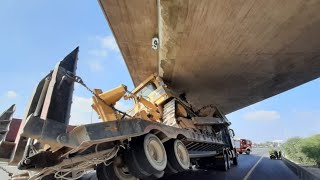 Highway 1 In Israel Blocked For Hours After Truck Transporting Tractor Gets Stuck Under Overpass