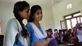 Two girl students singing welcome song in parsa dibya kanya girls school biranchibarwa