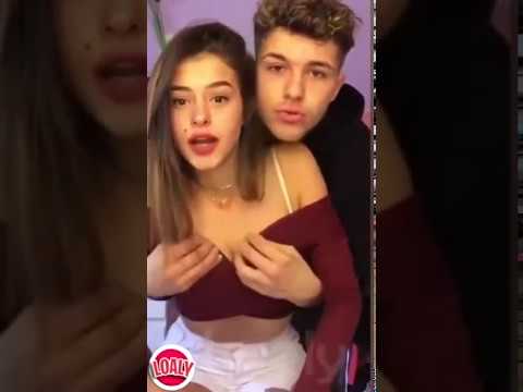 Boy touching tits of girl