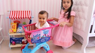 FAZENDO COMPRAS NO MERCADINHO DA ALICE - Gabriela Almeida