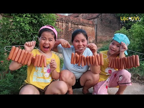 Lộc TiVi - Thử Thách Nướng 100 cây xúc xích bằng Móc treo đồ - Bake sausages with clothes hangers