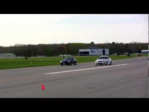 Mercedes CL63 AMG vs. BMW M5 (SMG)