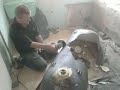 biff grinds steel bath in half