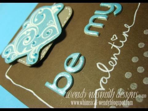 I've made this card using a dark brown and turquoise colour scheme 