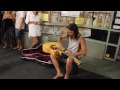 Busker playing amazing slap guitar on Flinders Street