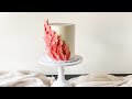 Coral & Gold Feather Cake Perfect for a Modern Wedding