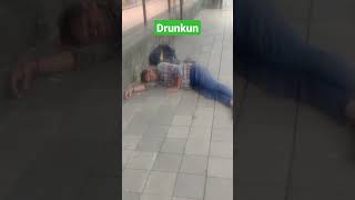 I He Drunk & Sleeping On Footpath Carelessly